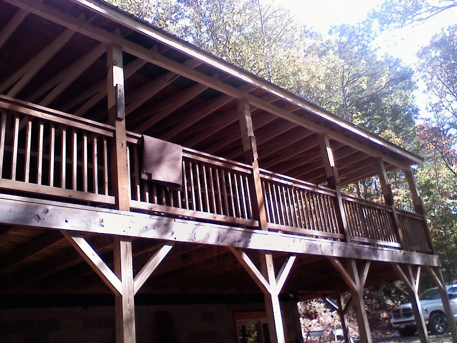 Timber framing under a new elevated porch and deck — Roof Leak Repair in North Prairie by Roofing Brothers